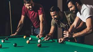 Guys playing pool
